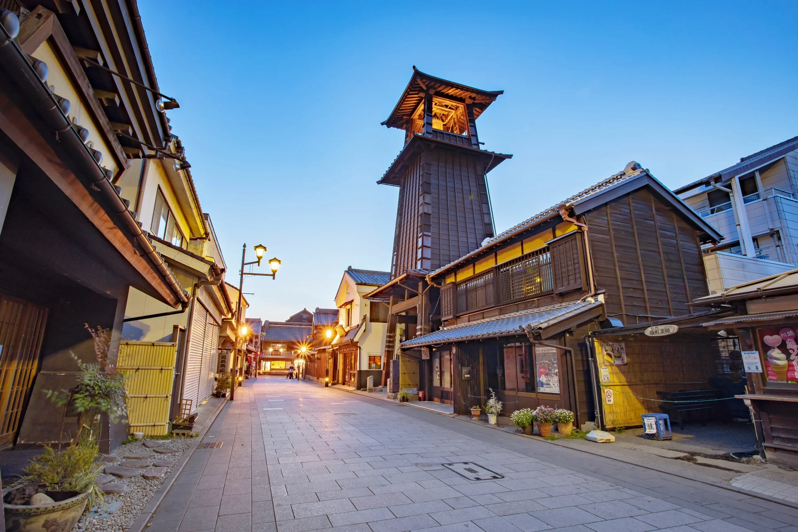 Toki no Kane bell tower and old warehouse street at dusk in Kawagoe, Saitama
