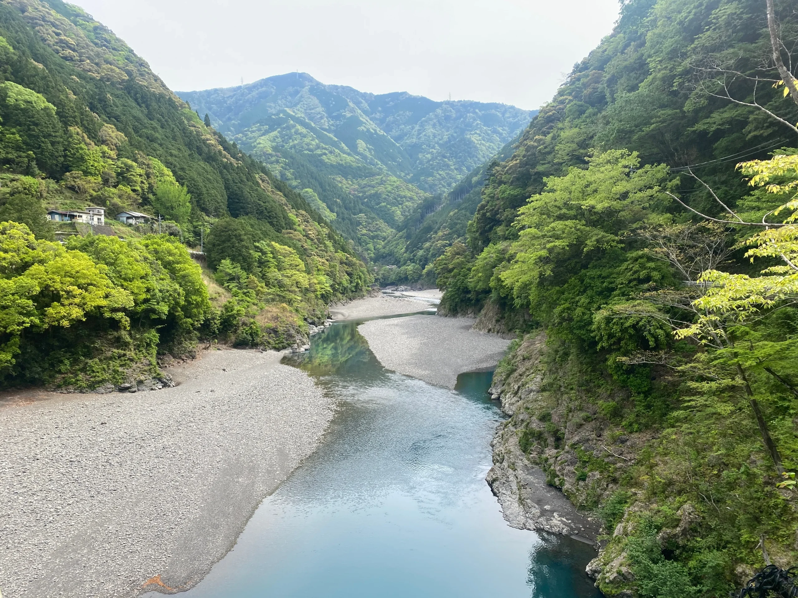 Serene mountain view with Kitayama River winding through lush green valleys