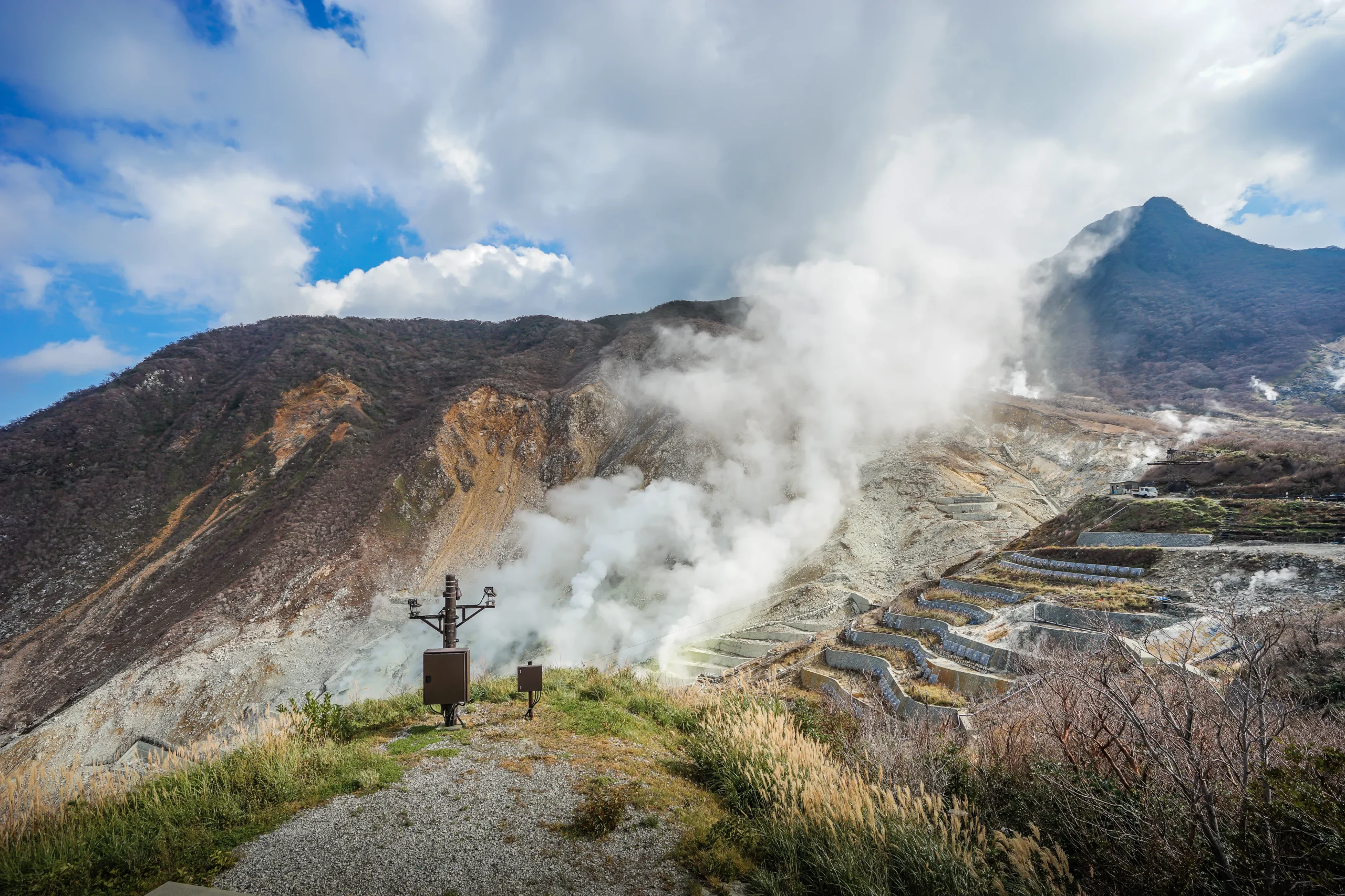 Volcanic steam rising from Owakudani Valley in Hakone, a famous geothermal spot in Japan