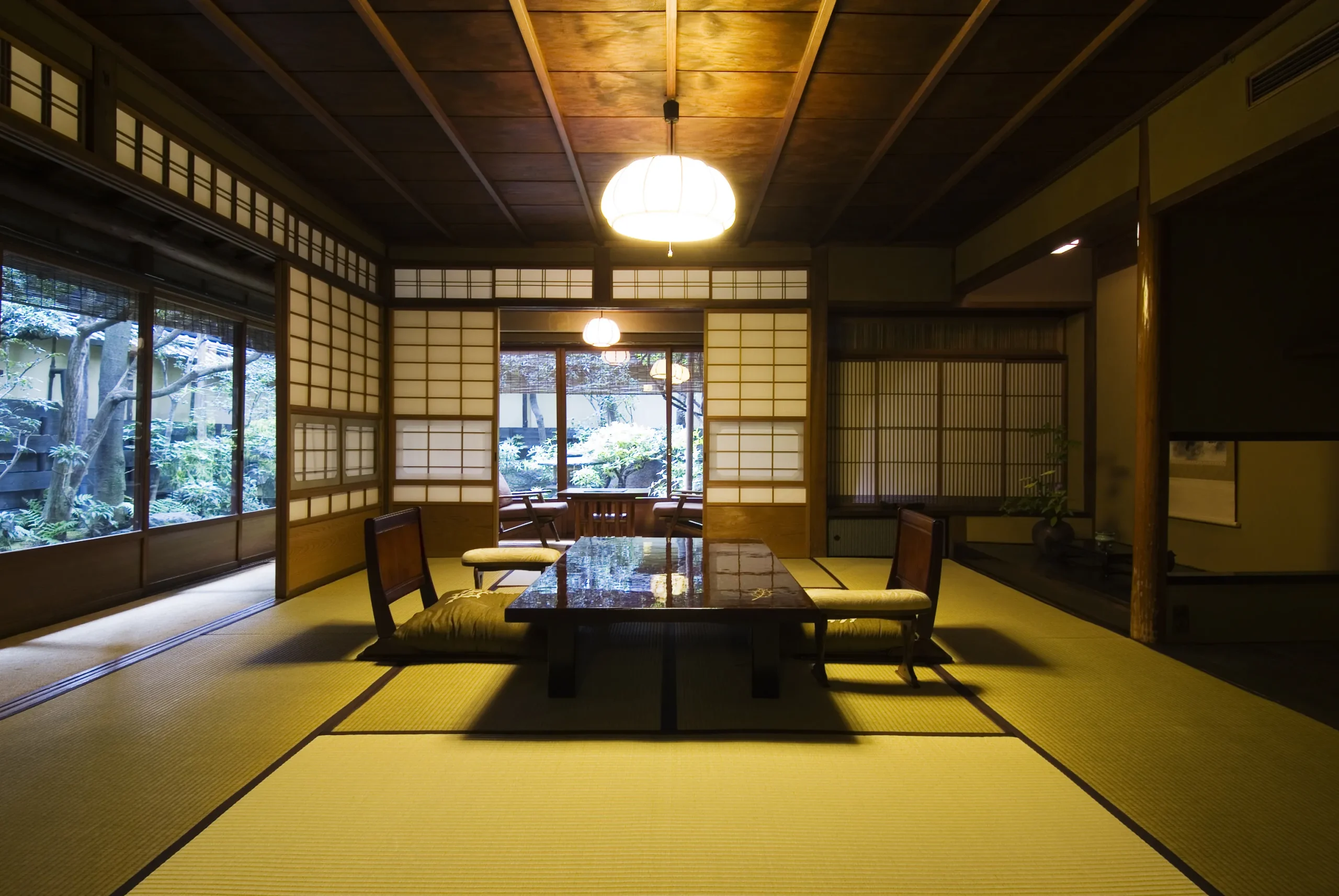 Traditional tatami room with shoji screens at Hiiragiya Ryokan in Kyoto, Japan
