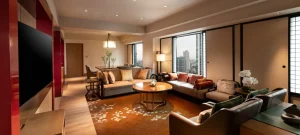 Spacious Hilton Osaka suite with elegant interiors and city skyline views