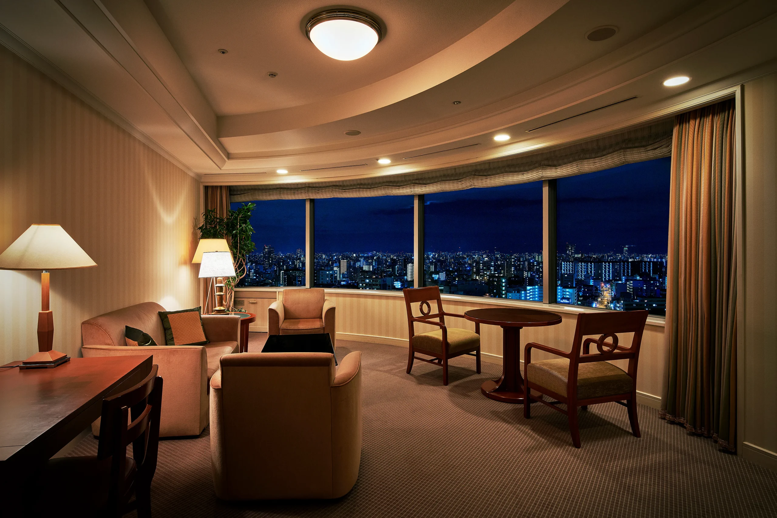 Classic suite at Imperial Hotel Osaka with night views of the city skyline