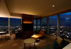 Panoramic city night view from Osaka Marriott Miyako Hotel luxury suite