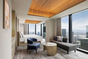 Luxury hotel room in Osaka with panoramic city views and modern interior design