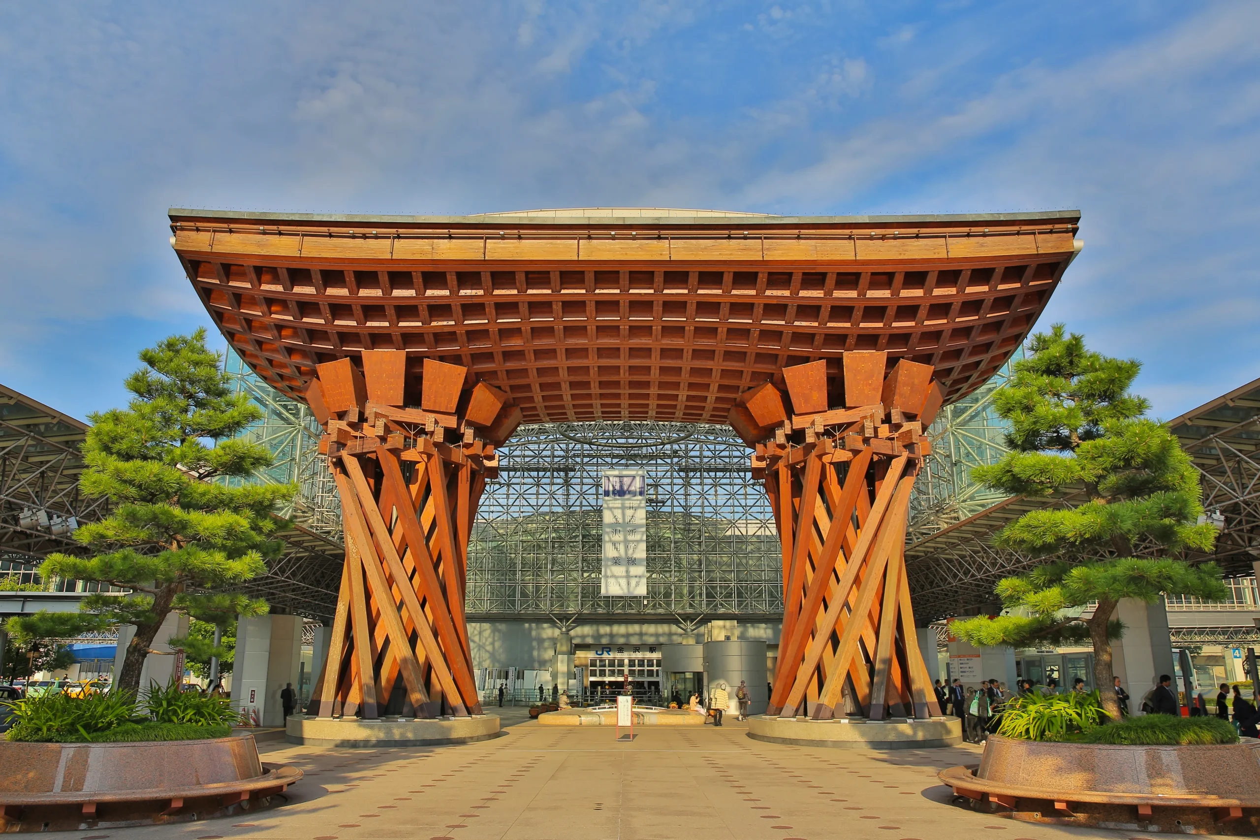 Wooden Tsuzumi-mon Gate at Kanazawa Station, a modern transport hub with traditional design
