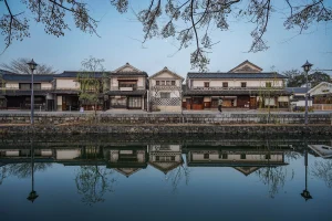 Traditional kura-style buildings along the canal in Kurashikiâ€™s historic district