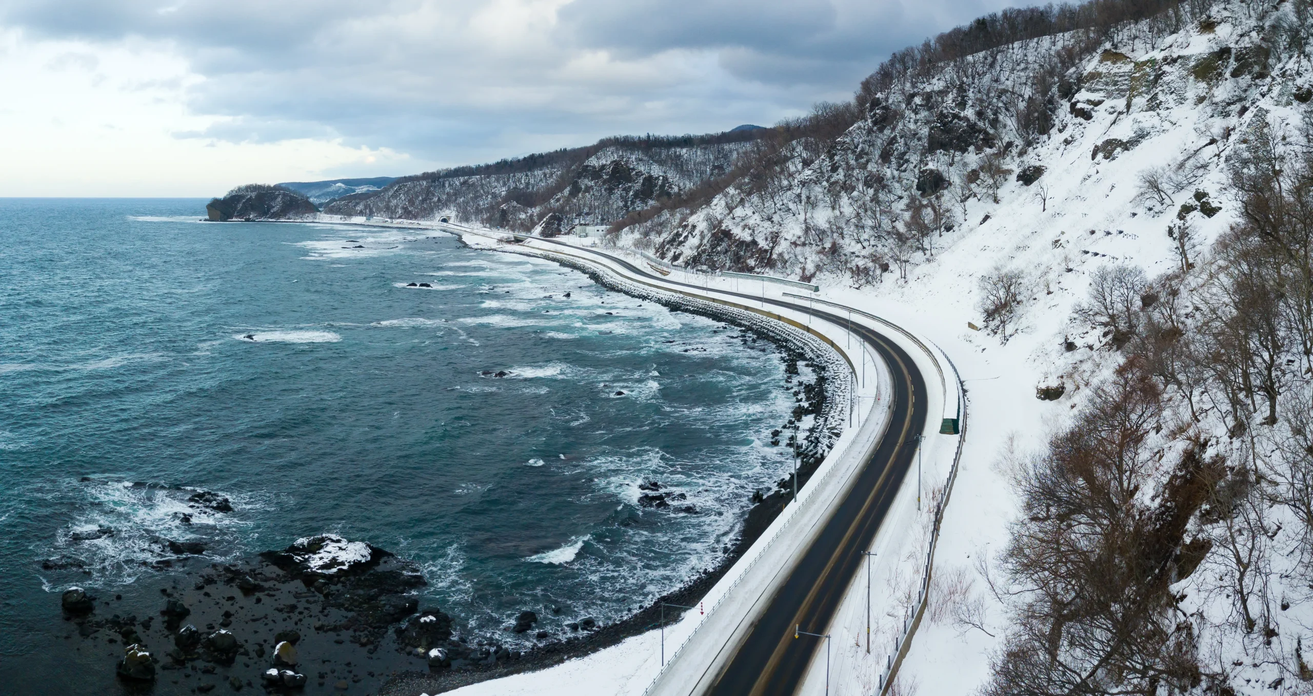 Coastal winter road trip along the Sea of Okhotsk in Shiretoko, Hokkaido, Japan