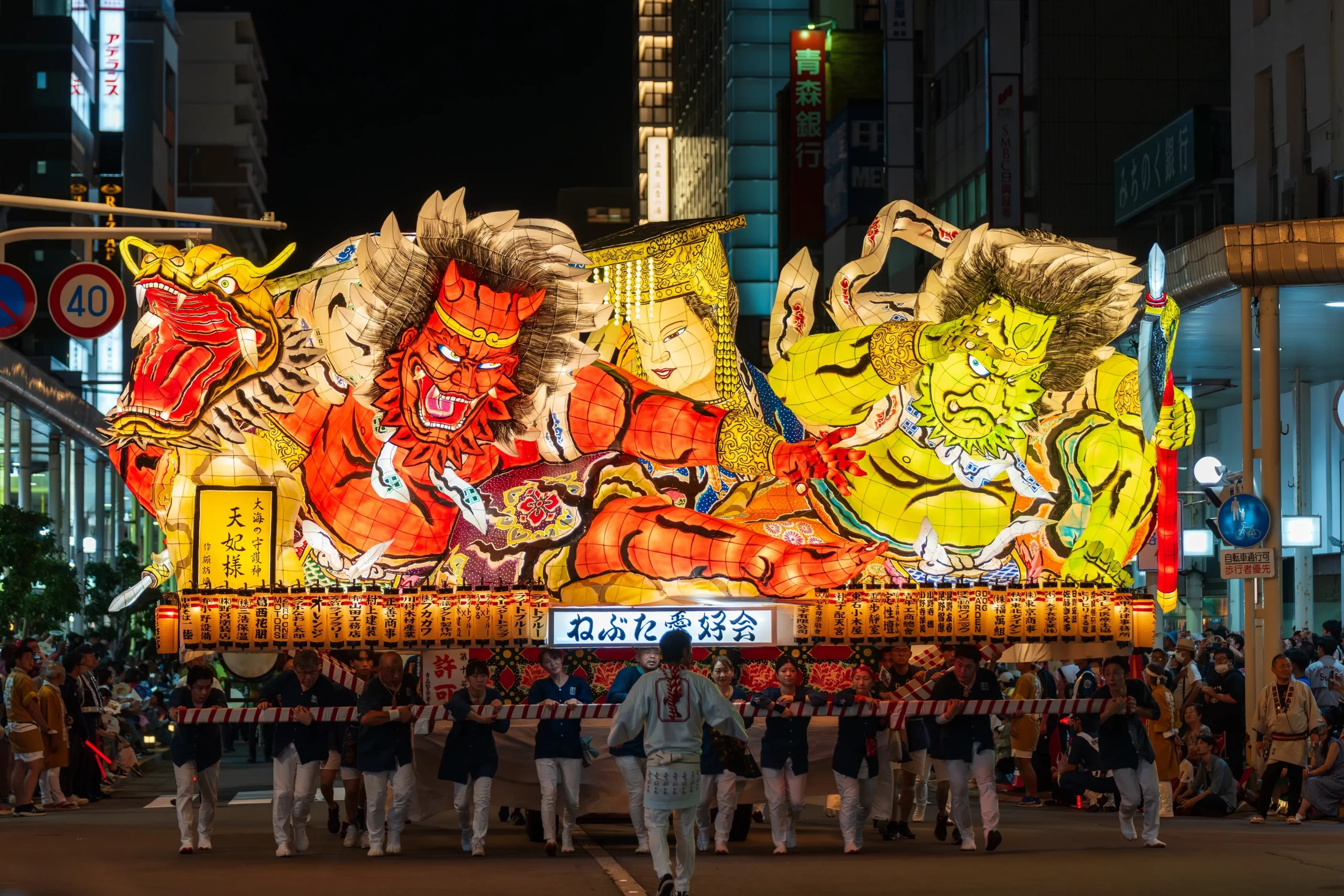 Illuminated warrior floats paraded at Aomori Nebuta Matsuri summer festival, Japan