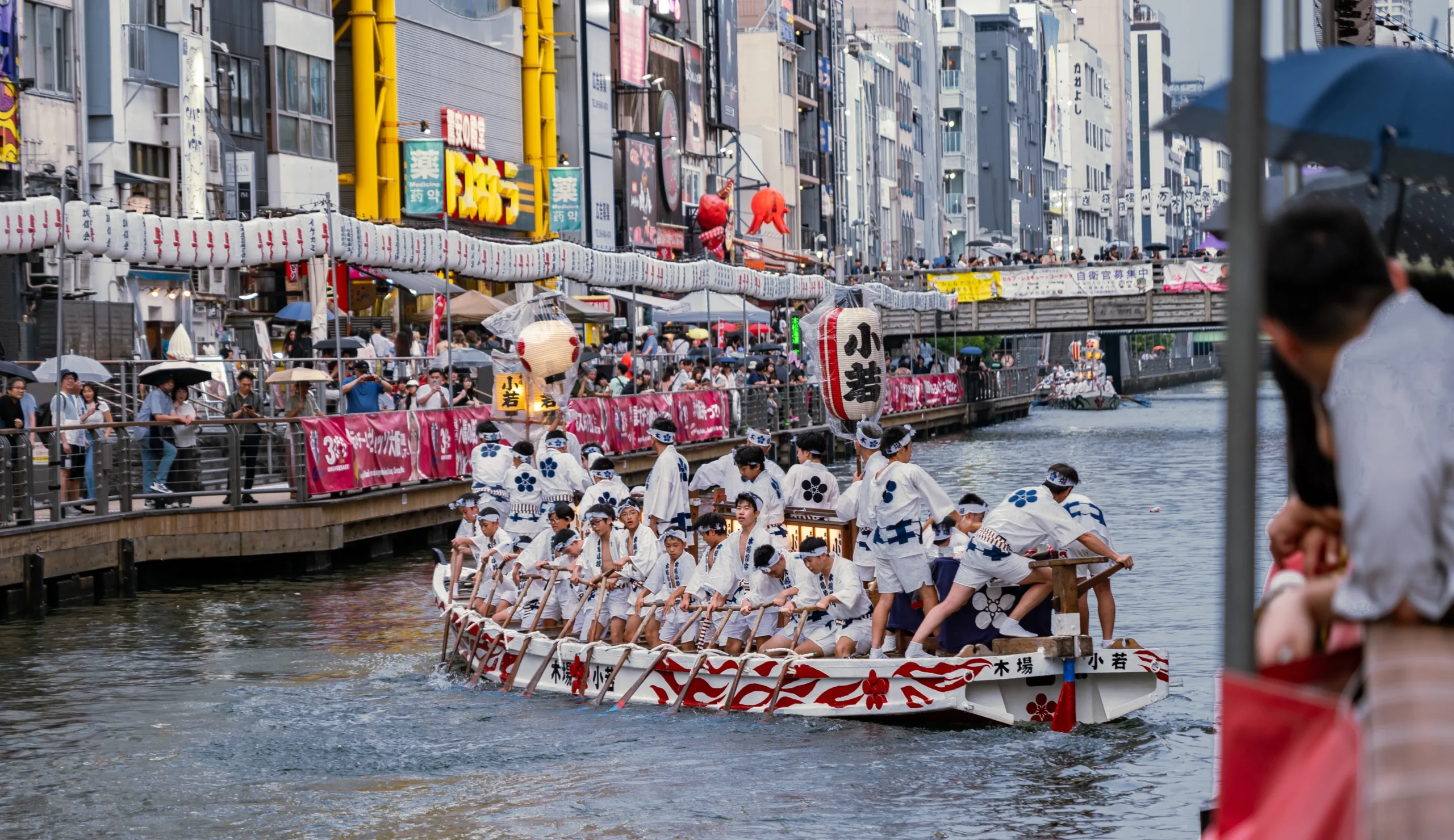 Boat parade during Tenjin Matsuri festival on Dotonbori Canal in Osaka, Japan