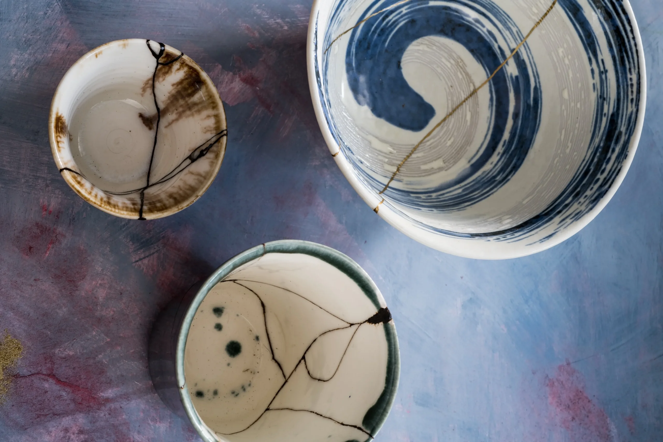Japanese ceramic bowls repaired with kintsugi gold joinery technique, Tokyo, Japan