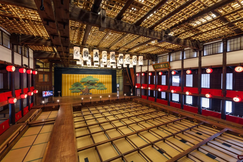 Interior of Konpira Grand Theatre in Kotohira, Japan, historic kabuki theater with wooden stage and lanterns