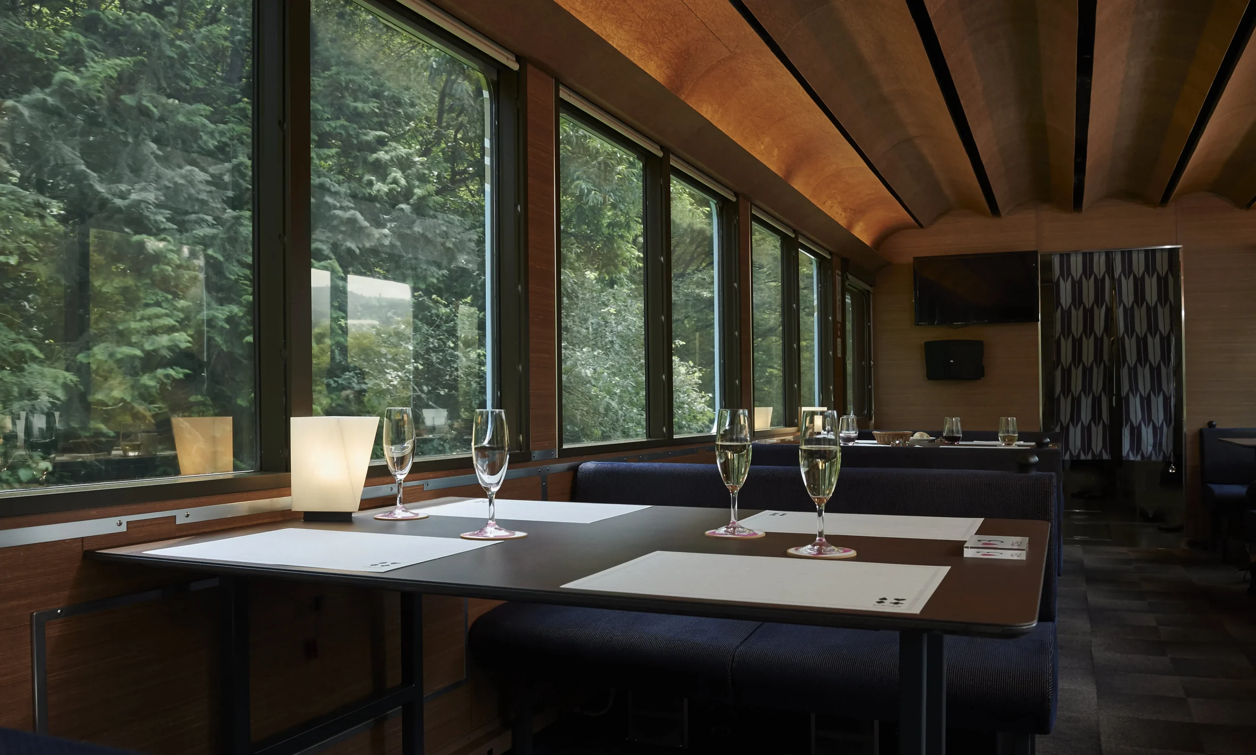 Dining car interior of Seibu 52 Seats of Happiness train, Japan, scenic restaurant train