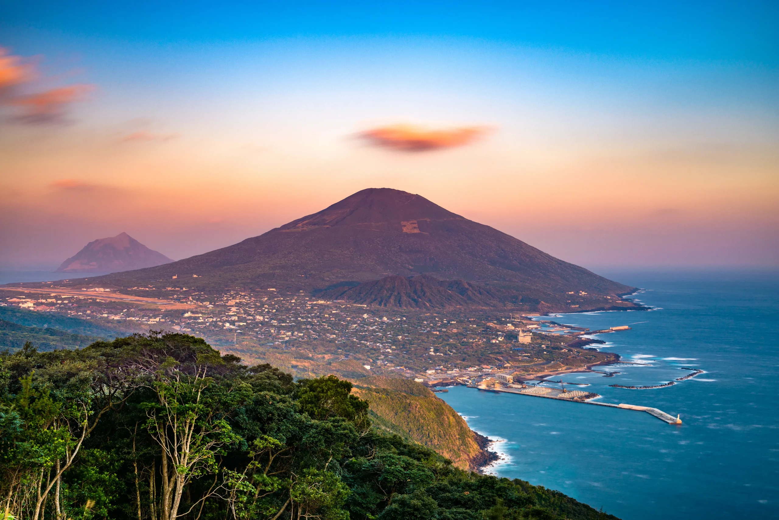 Aerial view of Mount Hachijo-fuji and the coastline of Hachijojima Island.