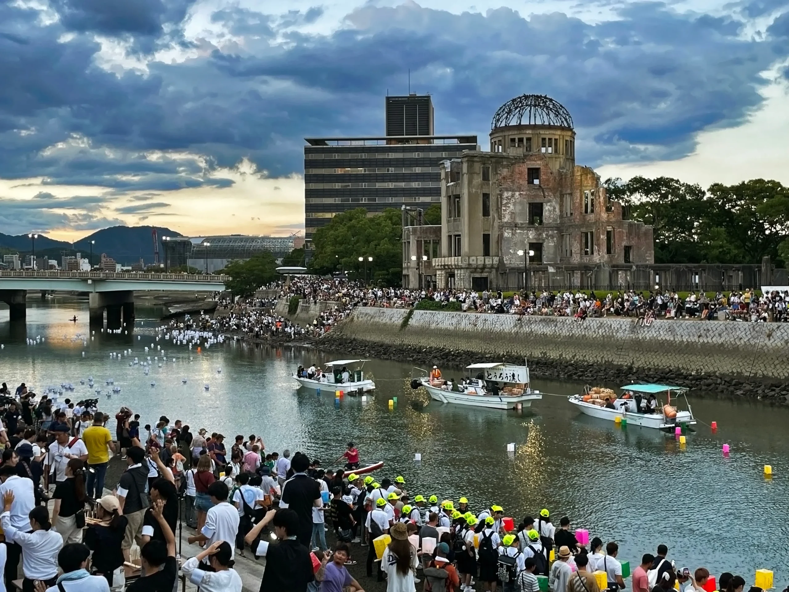 Crowds and floating lanterns at the Hiroshima Peace Memorial A-Bomb Dome.