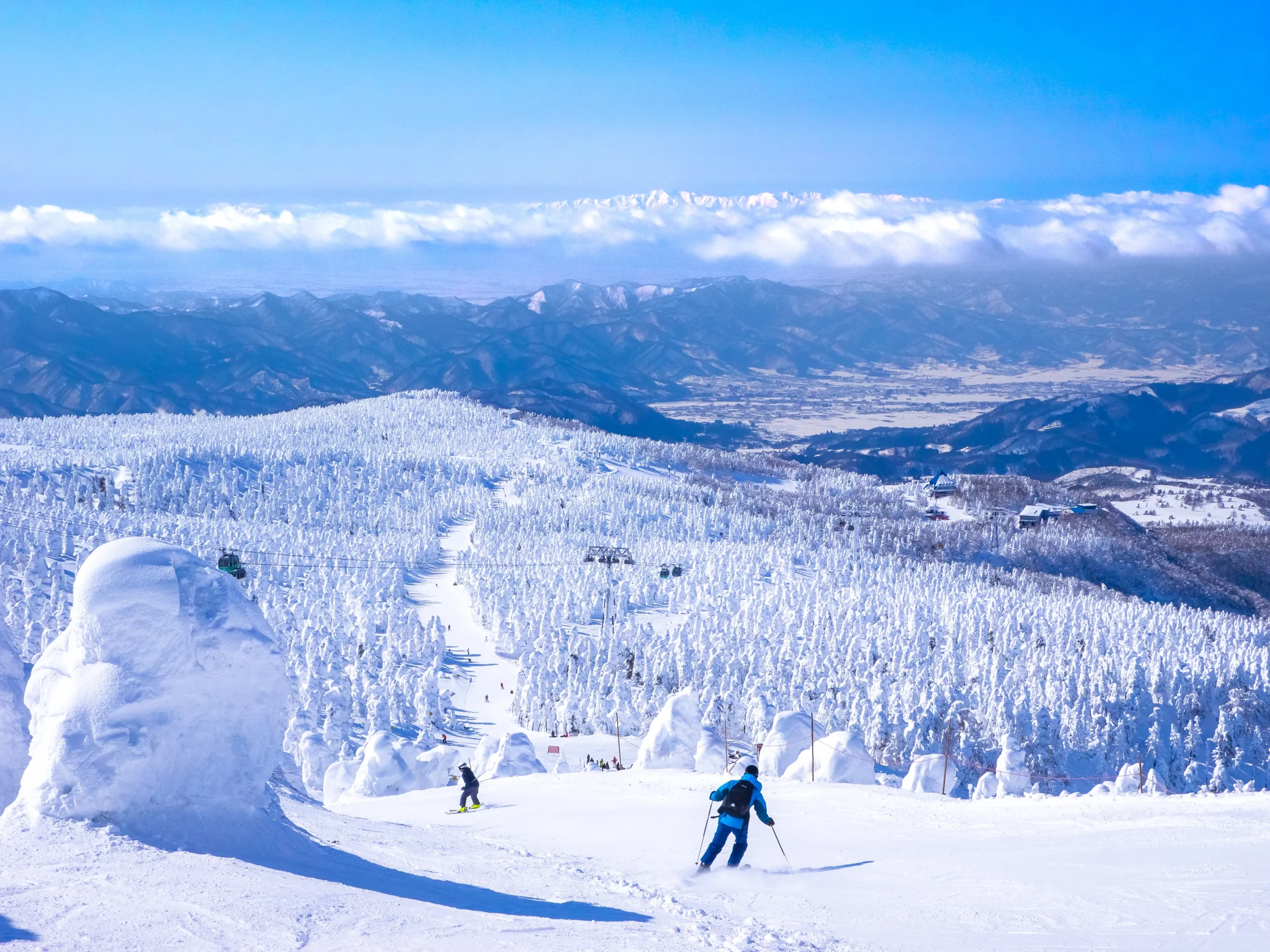 Skiers on the slopes of Mount Zao surrounded by "Snow Monsters" (ice-covered trees).