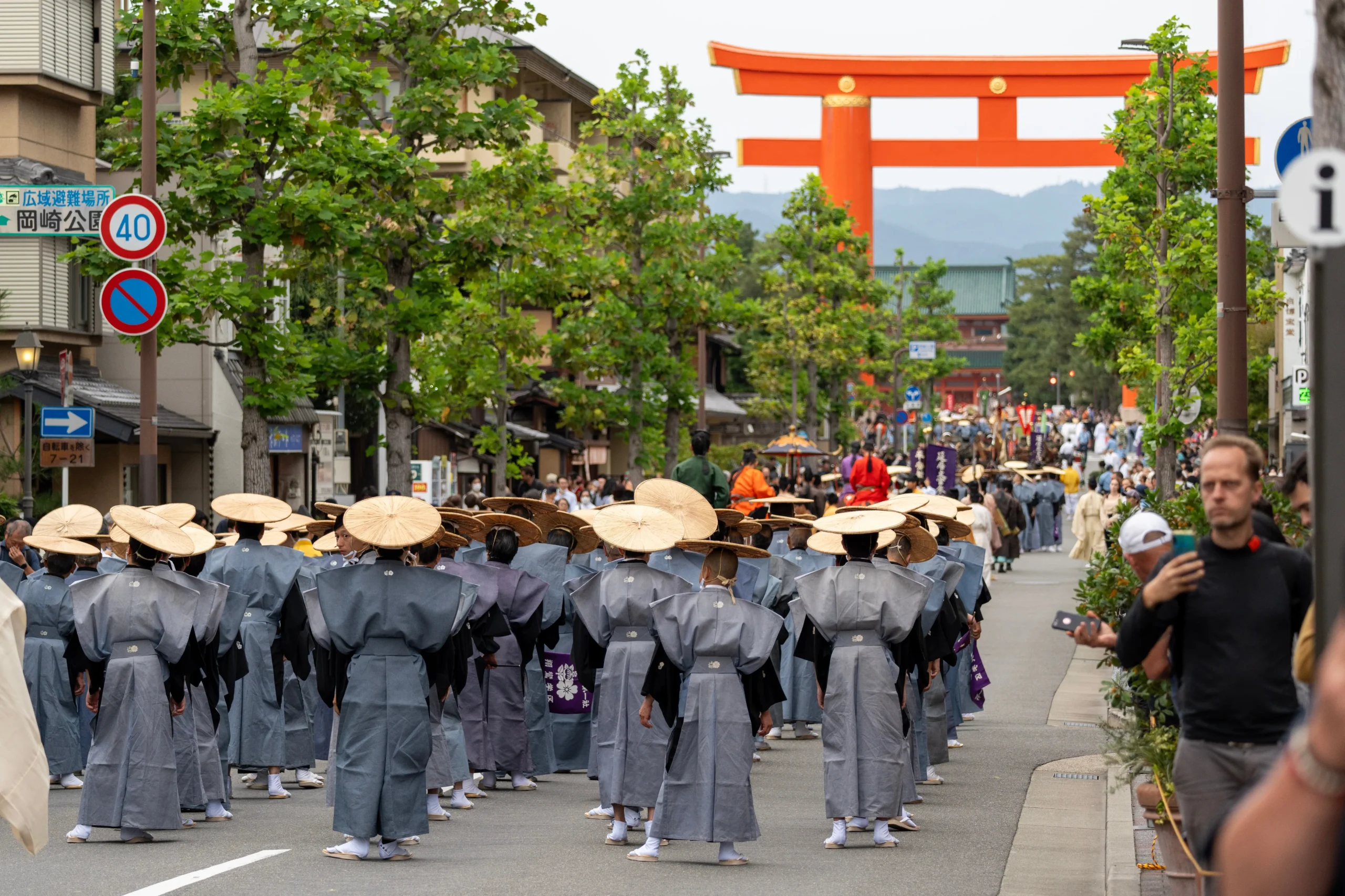 Jidai Matsuri festival in Kyoto with traditional costumes and large torii gate
