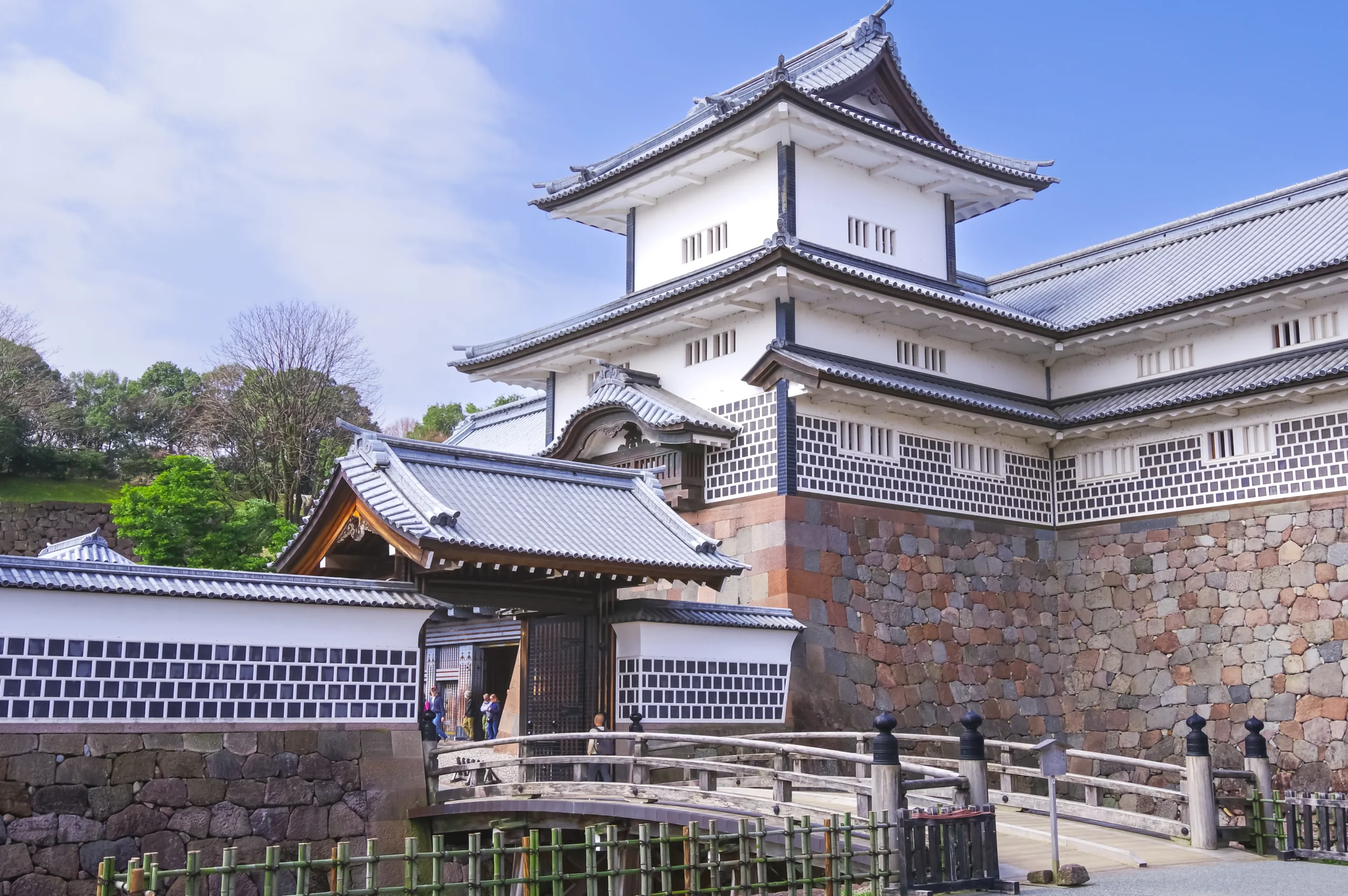 Kanazawa Castle in Ishikawa, Japan, white walls, stone base and historic gate