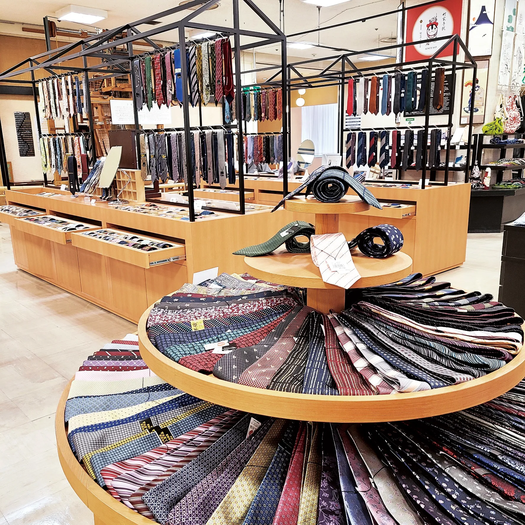 Nishijin Textile Center in Kyoto displaying traditional silk ties and woven fabrics
