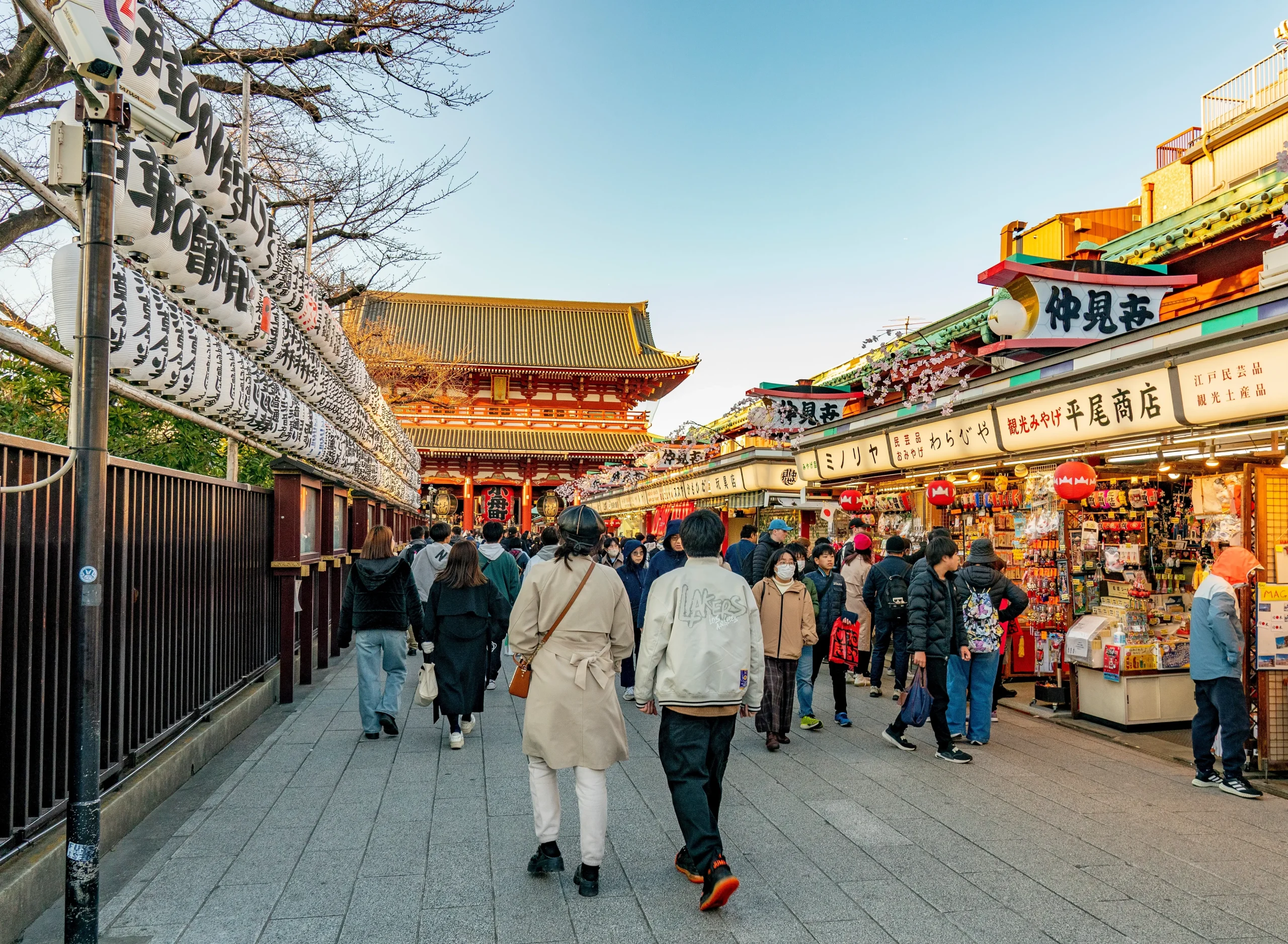 Asakusa Nakamise Street with shops and visitors leading to Sensoji Temple in Tokyo