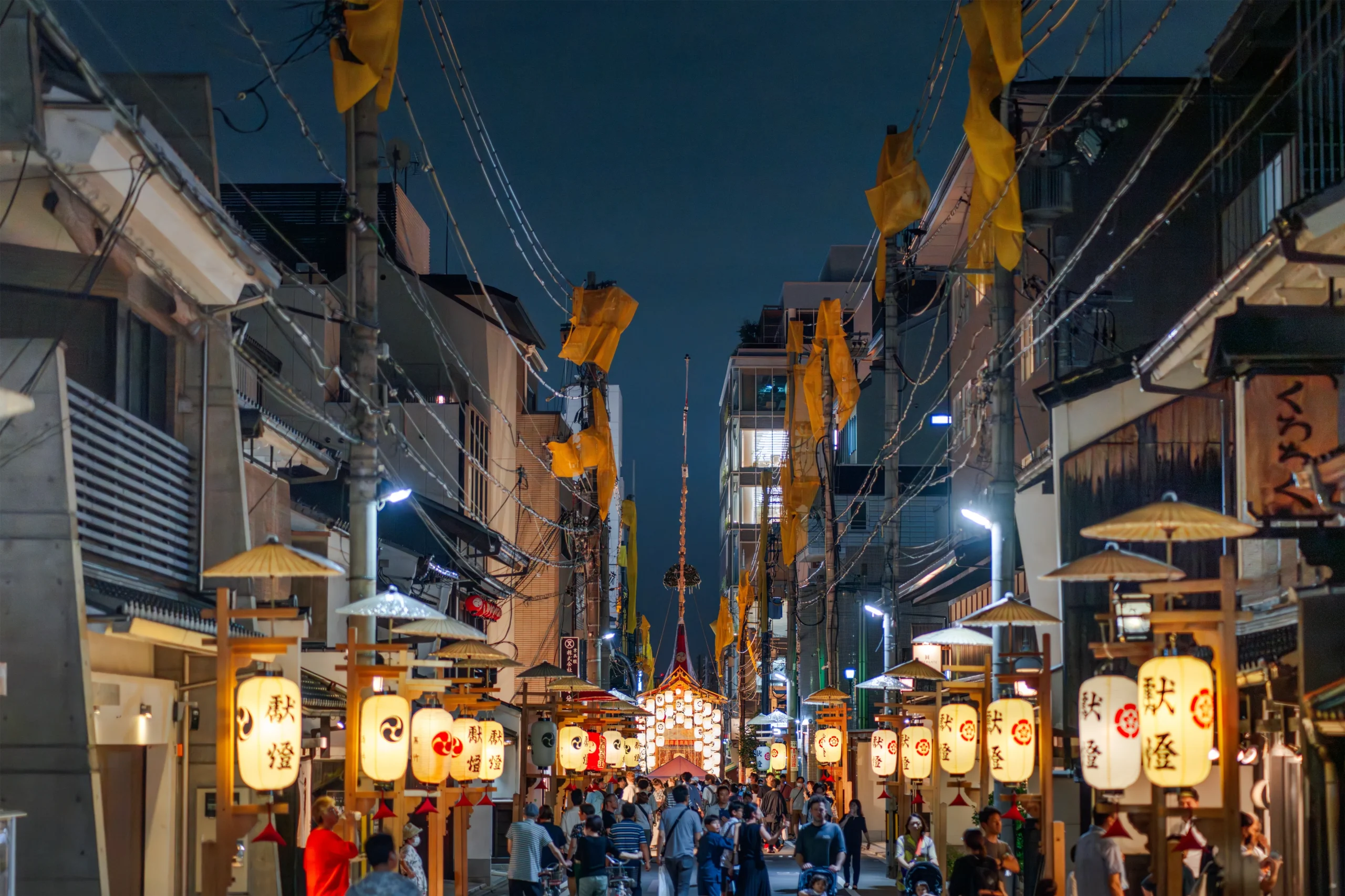 Lantern-lit streets of Kyoto during the evening celebrations of Gion Matsuri