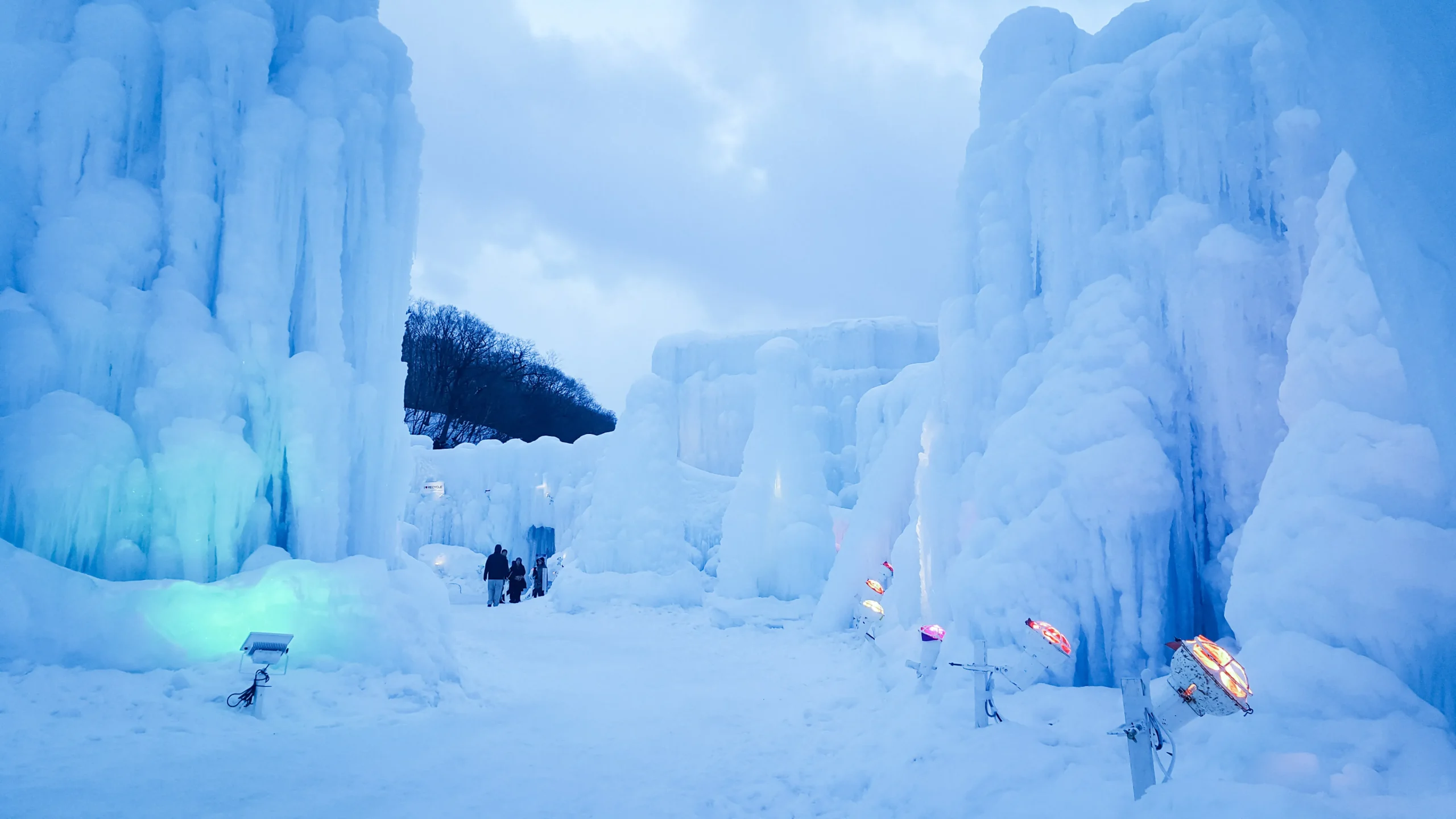 Blue illuminated ice formations at the Lake Shikotsu Ice Festival in Hokkaido