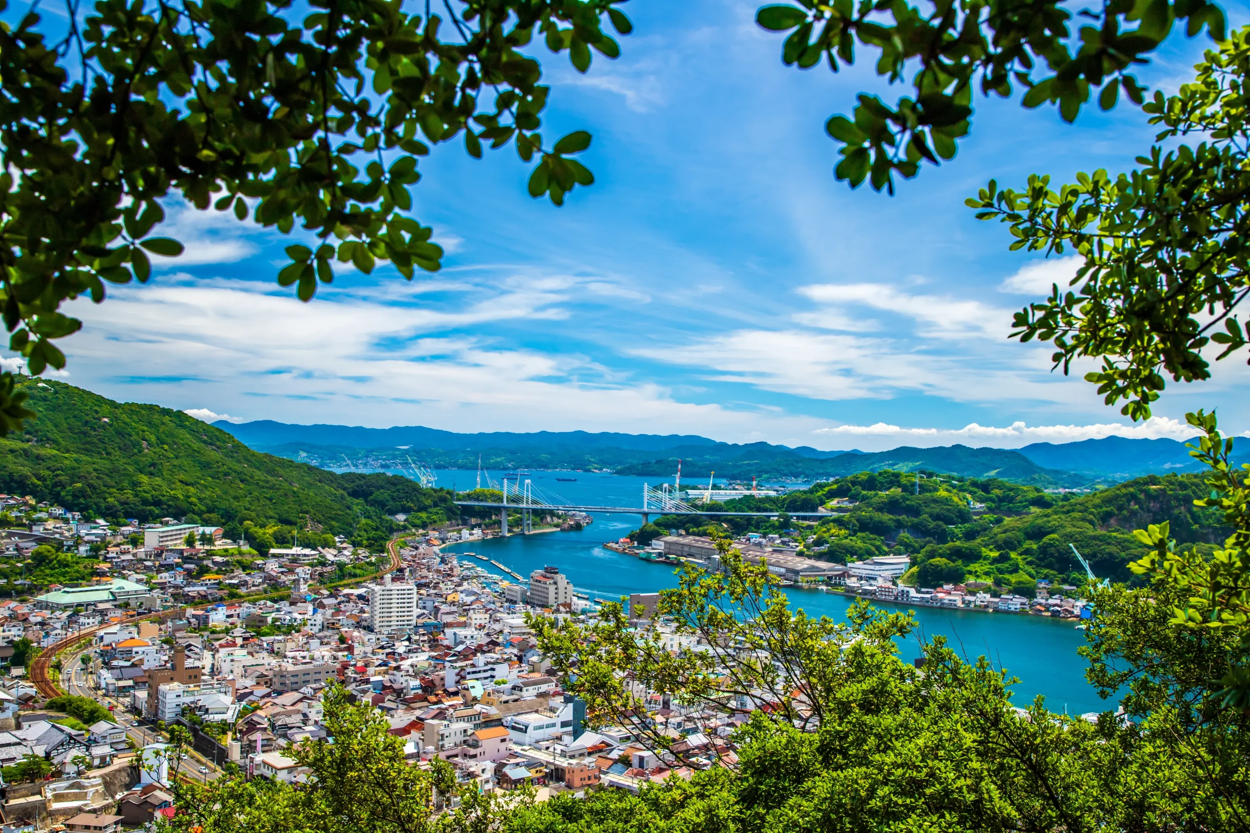 Hillside view over Onomichi town, the channel, and the bridge to Mukaishima