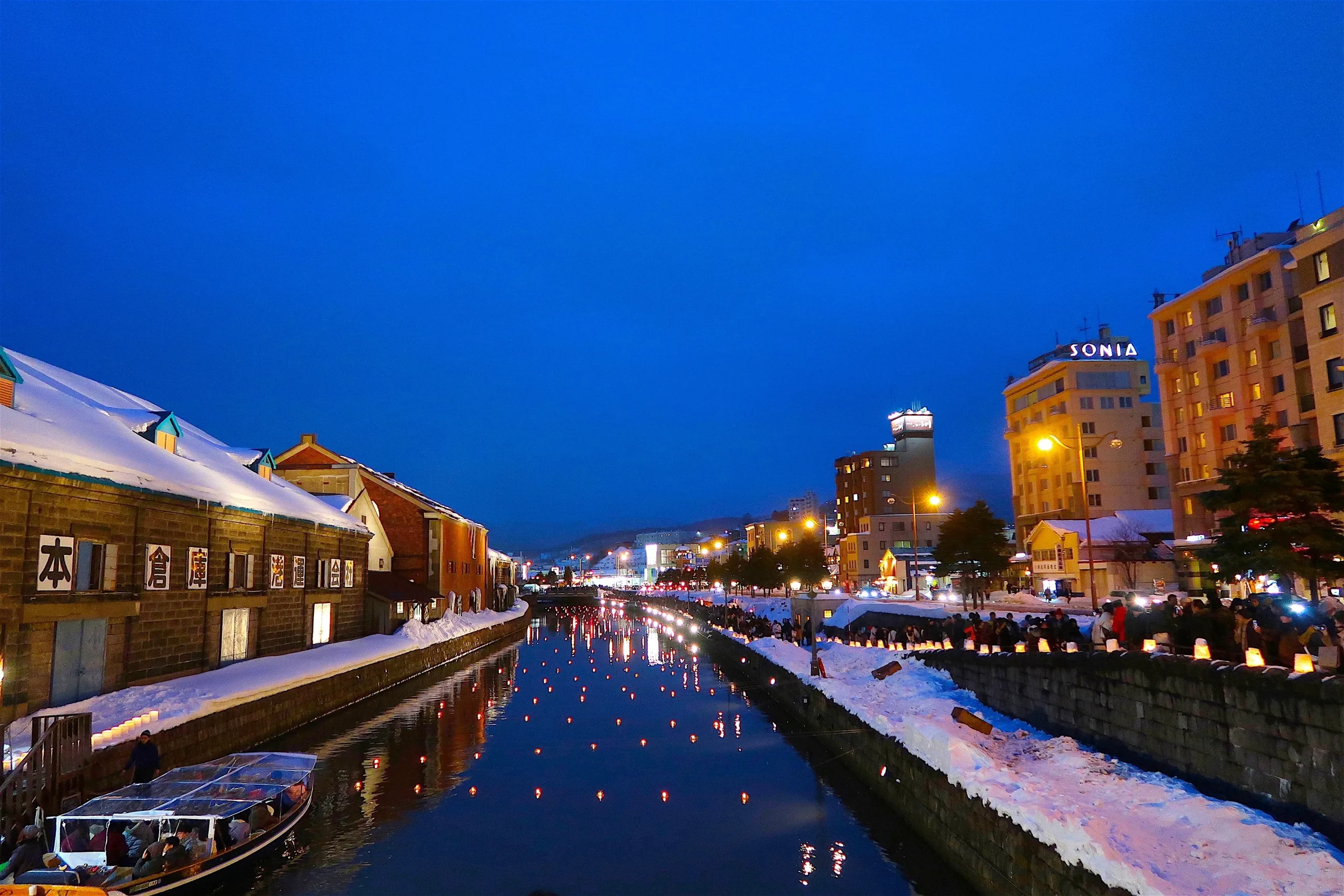 Otaru Canal illuminated with candles at the Snow Light Path Festival in winter