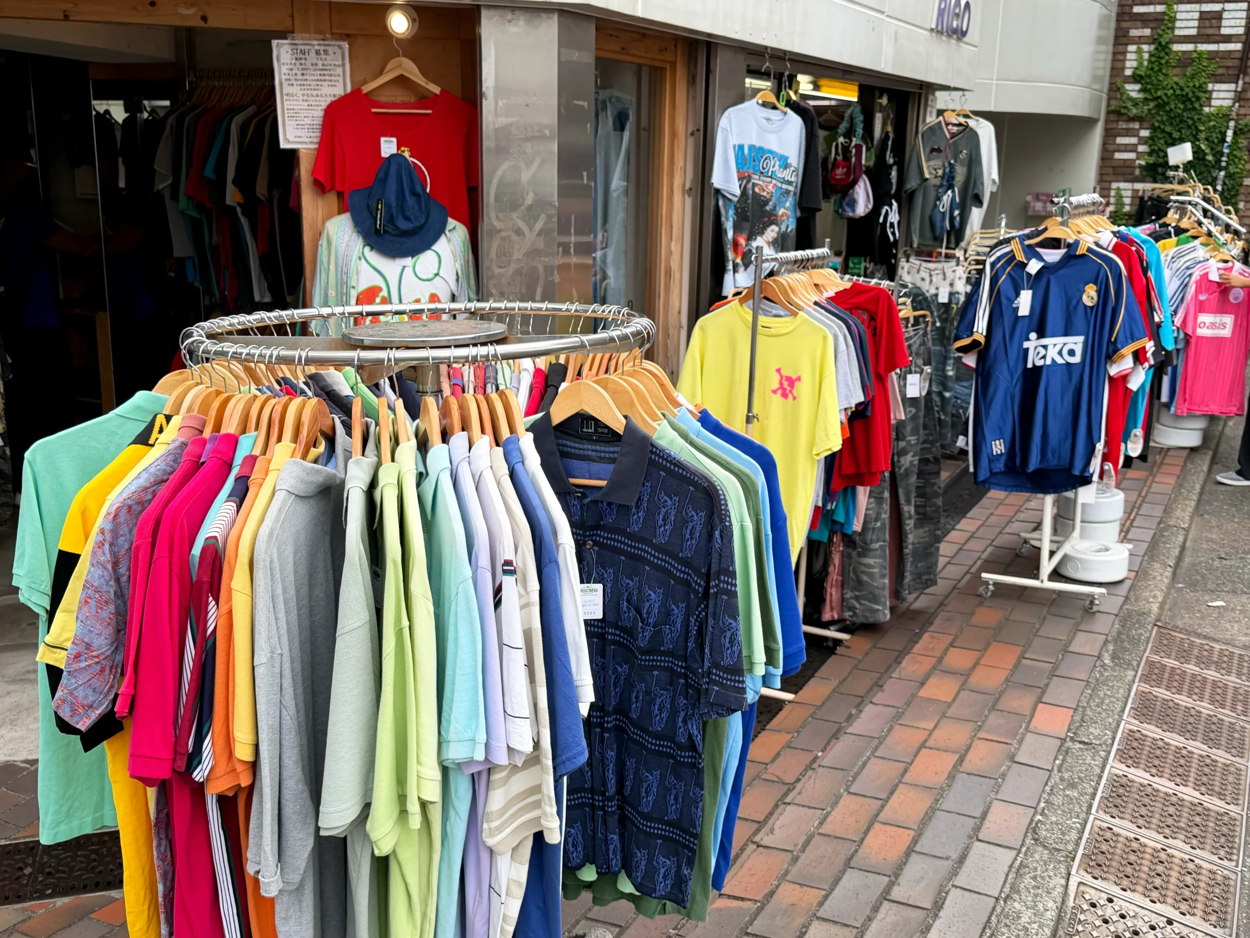 Colorful secondhand clothes displayed outside a vintage shop in Shimokitazawa, Tokyo