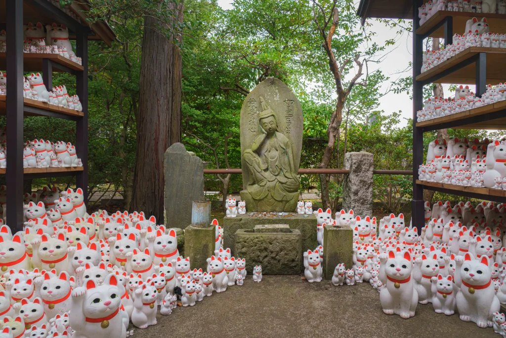 Maneki-neko cat figurines at Gotokuji Temple in Tokyo
