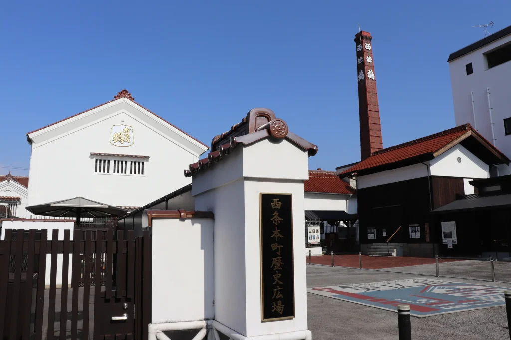 Traditional sake brewery buildings and red-brick chimney in Saijo, Hiroshima.